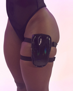 Holographic thigh bag worn by a person